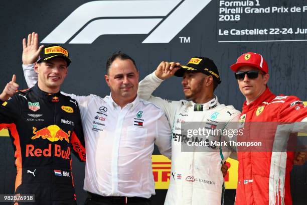 Top three finishers Lewis Hamilton of Great Britain and Mercedes GP, Max Verstappen of Netherlands and Red Bull Racing and Kimi Raikkonen of Finland...