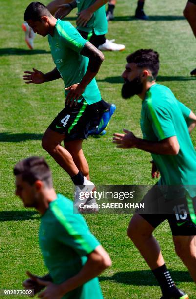Australia's forward Tim Cahill , midfielder Mile Jedinak and forward Tomi Juric attend a training session in Kazan on June 24, 2018 during the Russia...
