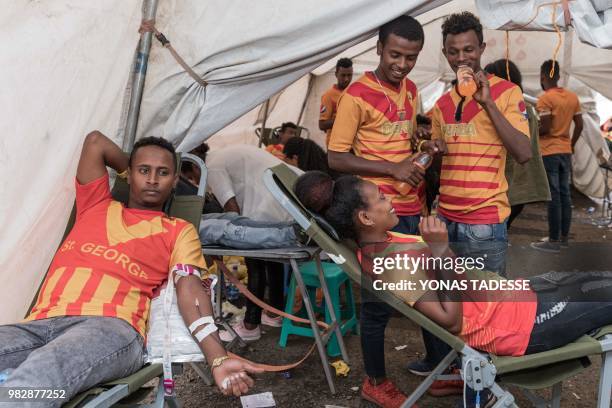 Supporters of Ethiopia's St. George Football Club, one of Addis Ababa's largest football team, donate blood at Ethiopia Red Cross in Addis Ababa, on...