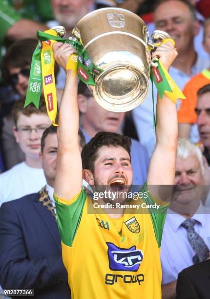 Monaghan , Ireland - 24 June 2018; Ryan McHugh of Donegal lifts the trophy following the Ulster GAA Football Senior Championship Final match between...