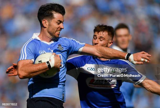 Dublin , Ireland - 24 June 2018; Michael Darragh Macauley of Dublin in action against Trevor Collins of Laois during the Leinster GAA Football Senior...