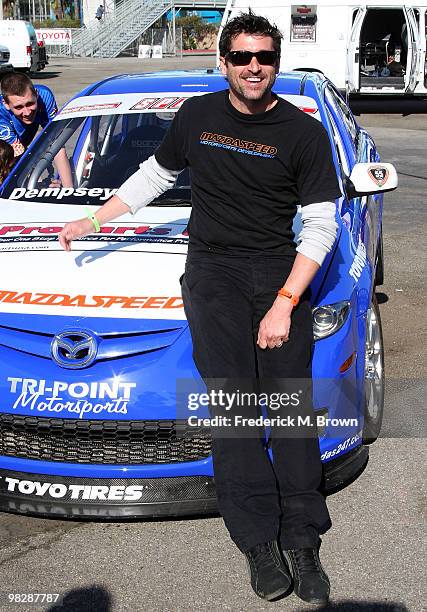 Actor Patrick Dempsey poses for photographers during the press practice day for the Toyota Pro/Celebrity Race on April 6, 2010 in Long Beach,...