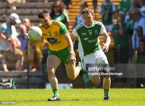 Monaghan , Ireland - 24 June 2018; Paddy McGrath of Donegal in action against Declan McCusker of Fermanagh during the Ulster GAA Football Senior...