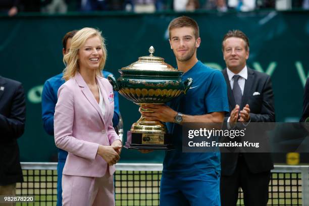 Gerry Weber testimonial international supermodel Eva Herzigova hands over the trophy to tennis player Borna Coric of Croatia during the Gerry Weber...