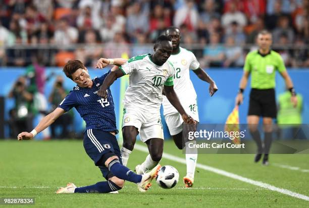 Hiroki Sakai of Japan tackles Sadio Mane of Senegal during the 2018 FIFA World Cup Russia group H match between Japan and Senegal at Ekaterinburg...