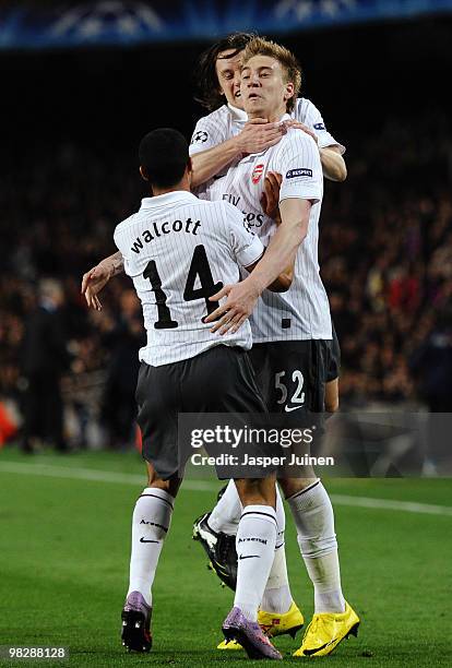 Nicklas Bendtner of Arsenal celebrates scoring the opening goal during the UEFA Champions League quarter final second leg match between Barcelona and...