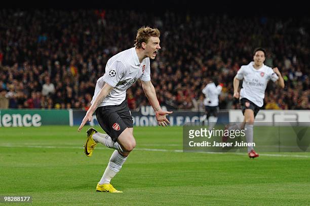 Nicklas Bendtner of Arsenal celebrates scoring the opening goal during the UEFA Champions League quarter final second leg match between Barcelona and...