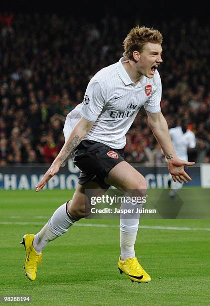 Nicklas Bendtner of Arsenal celebrates scoring the opening goal during the UEFA Champions League quarter final second leg match between Barcelona and...