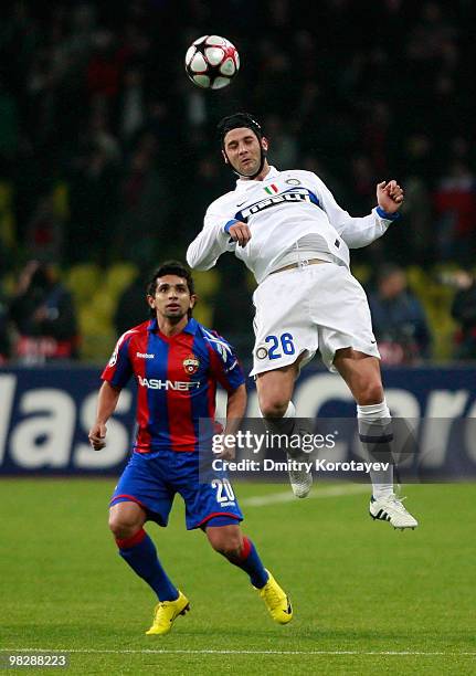 Guilherme of CSKA Moscow battles for the ball with Cristian Chivu of FC Internazionale Milano during the UEFA Champions League Quarter Finals, Second...