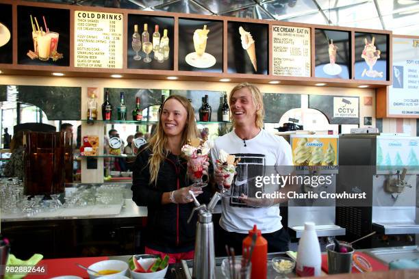 Caroline Wozniacki of Denmark and Denis Shapovalov of Canada make Sunday ice creams at a local parlour during Day Three of the Nature Valley...