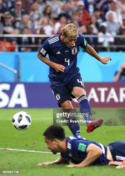 Keisuke Honda of Japan scores his team's second goal during the 2018 FIFA World Cup Russia group H match between Japan and Senegal at Ekaterinburg...