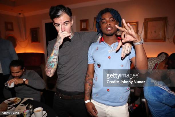 Stefan James and Lou Got Cash attend the Republic Records BET Awards Dinner at Beauty & Essex on June 23, 2018 in Los Angeles, California.