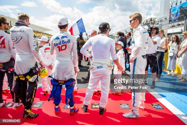 Nico Hulkenberg of Germany and Renault, Pierre Gasly of Scuderia Toro Rosso and France, Fernando Alonso of McLaren and Spain, Sergey Sirotkin of...