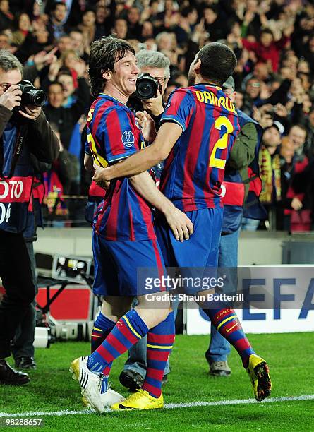 Lionel Messi of Barcelona celebrates scoring their second goal with Daniel Alves during the UEFA Champions League quarter final second leg match...