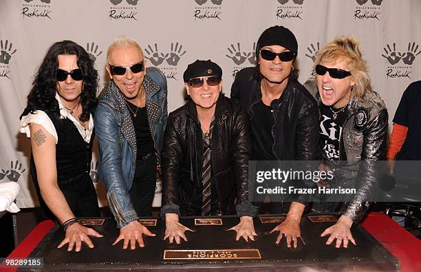 The Scorpions Pawel Maciwoda, Rudolf Schenker, Klaus Meine, Matthias Jabs, James Kottak, are inducted on Hollywood's RockWalk on April 6, 2010 in Los...