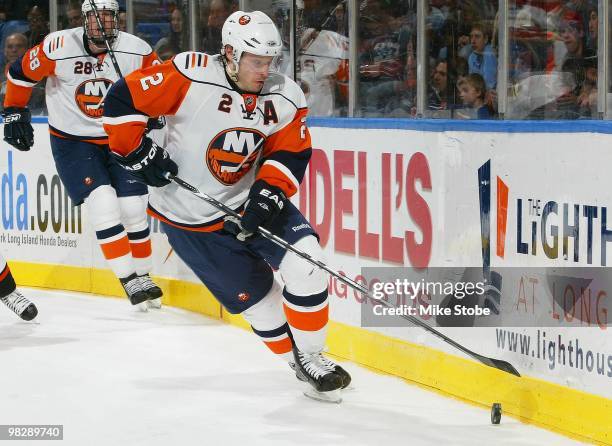 Mark Streit of the New York Islanders skates against the Philadelphia Flyers on April 1, 2010 at Nassau Coliseum in Uniondale, New York. Islanders...