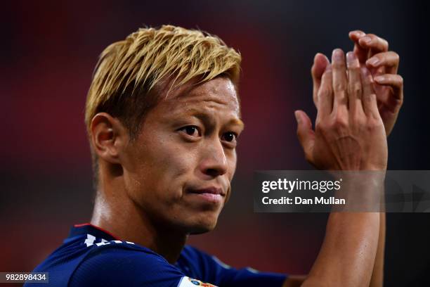 Keisuke Honda of Japan applauds fans after the 2018 FIFA World Cup Russia group H match between Japan and Senegal at Ekaterinburg Arena on June 24,...