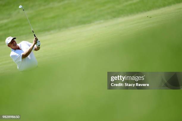 Colin Montgomerie of Scotland hits his third shot on the ninth hole during the third and final round of the American Family Championship at...