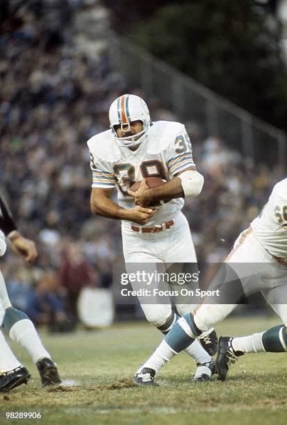 Running back Larry Csonka of the Miami Dolphins in action carries the ball circa early 1970's during an NFL football game. Csonka played for the...