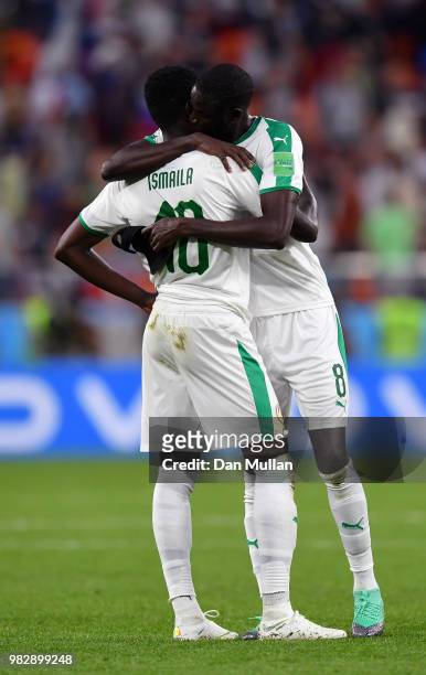 Cheikhou Kouyate of Senegal hugs teammate Sadio Mane Gueye following the 2018 FIFA World Cup Russia group H match between Japan and Senegal at...