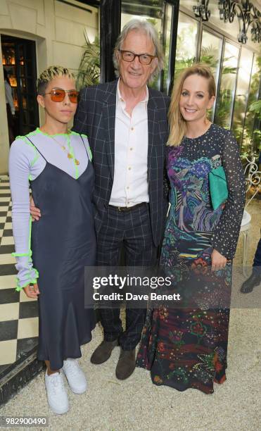 Poppy Ajudha, Sir Paul Smith and Joanne Froggatt, all wearing Paul Smith, attend the Paul Smith SS19 VIP dinner during Paris Fashion Week at Hotel...