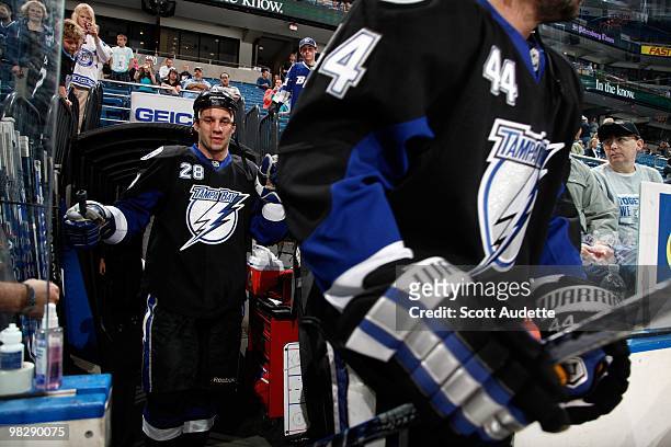 Zenon Konopka of the Tampa Bay Lightning walks to the ice for the game against the New York Rangers at the St. Pete Times Forum on April 2, 2010 in...