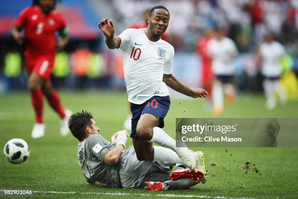 Raheem Sterling of England is tackled by Jaime Penedo during the 2018 FIFA World Cup Russia group G match between England and Panama at Nizhniy...