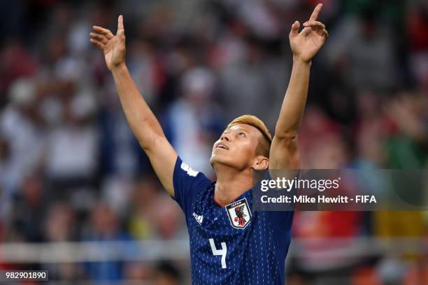 Keisuke Honda of Japan celebrates after scoring his sides second goal during the 2018 FIFA World Cup Russia group H match between Japan and Senegal...