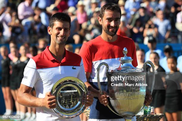 Marin Cilic of Croatia and Novak Djokovic of Serbia pose after Day 7 of the Fever-Tree Championships at Queens Club on June 24, 2018 in London,...