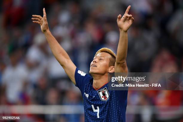 Keisuke Honda of Japan celebrates after scoring his sides second goal during the 2018 FIFA World Cup Russia group H match between Japan and Senegal...