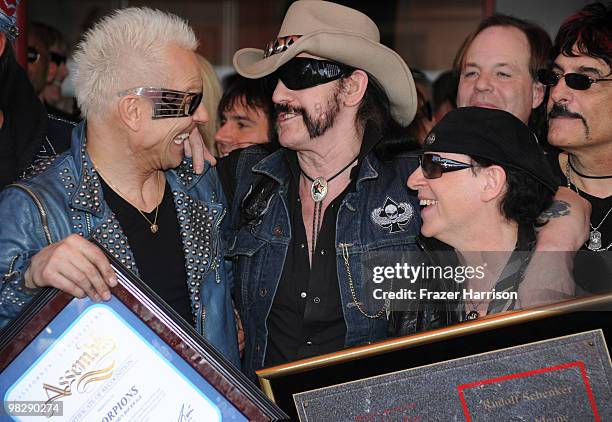 Guitarist Ruldolf Schenker,Lemmy Kilmister,of Motorhead and vocalist Klaus Meine of The Scorpions Are Inducted On Hollywood's RockWalk on April 6,...