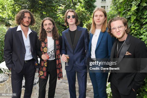 Charlie Salt, Josh Dewhurst, Tom Ogden, Myles Kellock and Joe Donovan of Blossoms, all wearing Paul Smith, attend the Paul Smith SS19 Menswear Show...