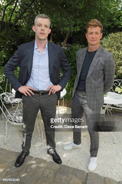 Russell Tovey and Ed Speleers, both wearing Paul Smith, attends the Paul Smith SS19 VIP dinner during Paris Fashion Week at Hotel Particulier...