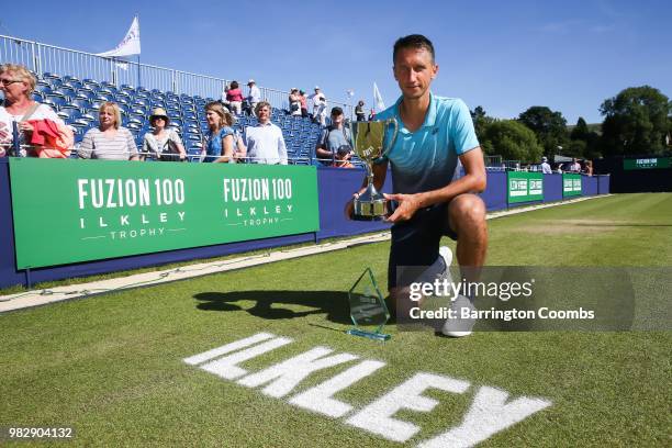 Sergiy Stakhovsky of the Ukraine poses with his trophies after winning the final against Oscar Otte of Germany on day Eight of the Fuzion 100 Ikley...