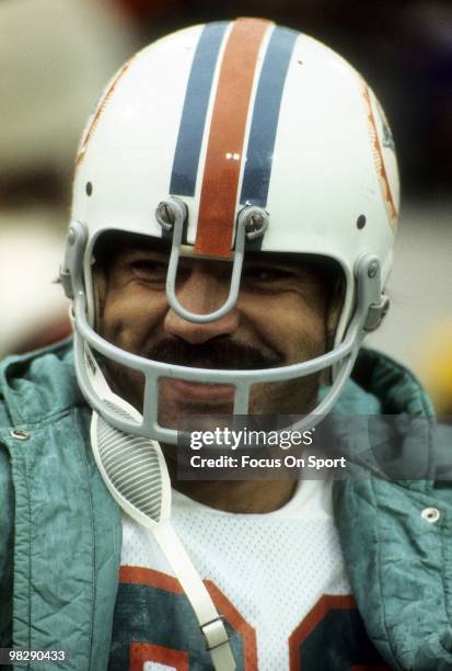 Running back Larry Csonka of the Miami Dolphins watches the action from the sidelines circa mid 1970's during an NFL football game. Csonka played for...