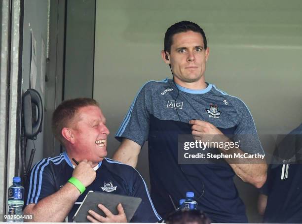 Dublin , Ireland - 24 June 2018; Injured Dublin captain Stephen Cluxton, right, and Chris Farrell Dublin Performance Video Analyst, prior to the...