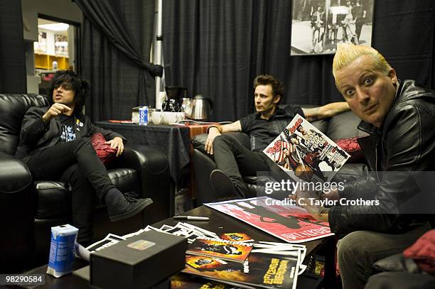 Musicians Billie Joe Armstrong, Mike Dirnt and Tre Cool of Green Day pose backstage at the Wachovia Spectrum on July 21, 2009 in Philadelphia,...