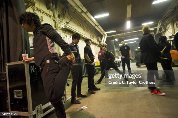 Musicians Billie Joe Armstrong, Mike Dirnt and Tre Cool of Green Day pose backstage at the Wachovia Spectrum on July 21, 2009 in Philadelphia,...