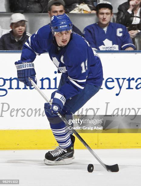 Tomas Kaberle of the Toronto Maple Leafs looks to pass the puck during the game against the Boston Bruins on April 3, 2010 at the Air Canada Centre...