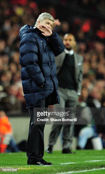 Manager of Arsenal Arsene Wenger looks dejected during the UEFA Champions League quarter final second leg match between Barcelona and Arsenal at Camp...
