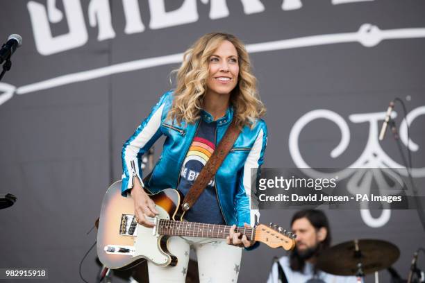 Sheryl Crow performs on stage during the Isle of Wight festival at Seaclose Park, Newport.
