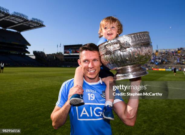 Dublin , Ireland - 24 June 2018; Darren Daly of Dublin and his son Odhrán, age 2, following the Leinster GAA Football Senior Championship Final match...