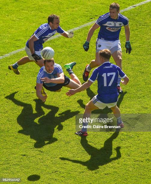 Dublin , Ireland - 24 June 2018; Dean Rock of Dublin in action against Laois players, left to right, Gareth Dillon, Mark Timmons and Ross Munnelly...