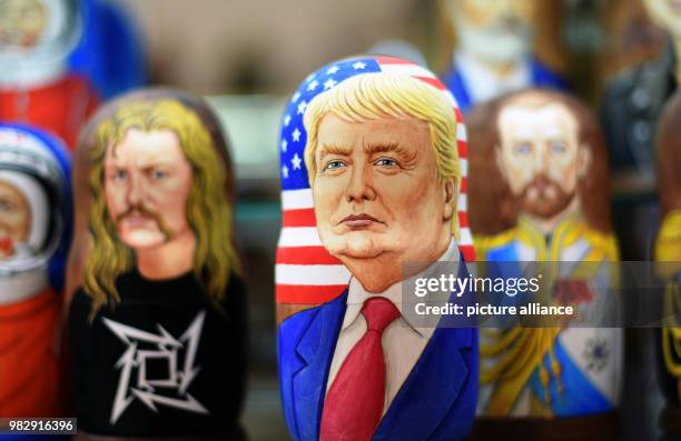 June 2018, Russia, Moscow: A Matryoshka with the image of US President Donald Trump in a souvenir shop. Photo: Ina Fassbender/dpa