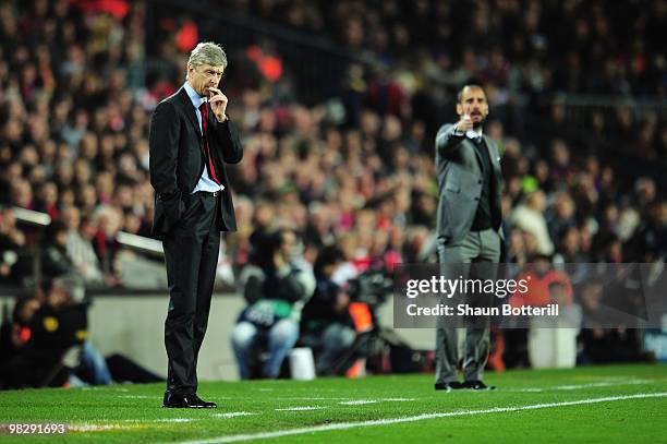 Manager of Arsenal Arsene Wenger and manager of Barcelona Josep Guardiola react on the touchline during the UEFA Champions League quarter final...