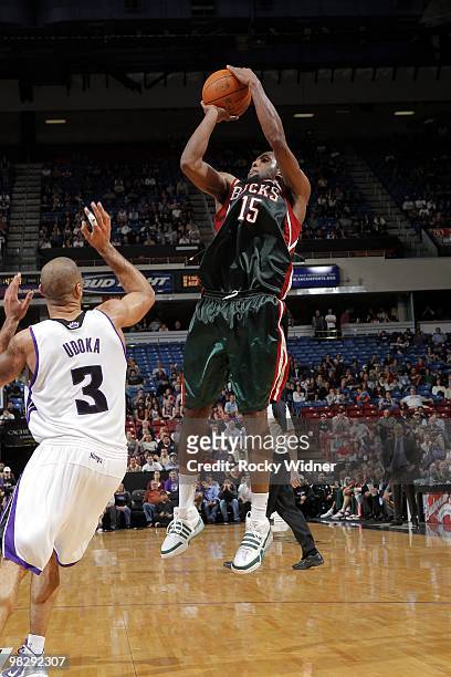 John Salmons of the Milwaukee Bucks shoots a jump shot against Ime Udoka of the Sacramento Kings during the game at Arco Arena on March 19, 2010 in...