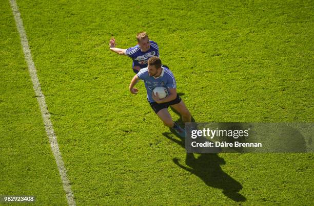 Dublin , Ireland - 24 June 2018; Jack McCaffrey of Dublin in action against Benny Carroll of Laois during the Leinster GAA Football Senior...