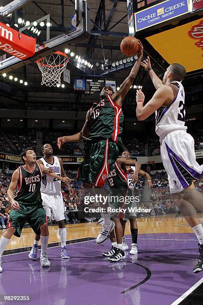 John Salmons of the Milwaukee Bucks rebounds against Francisco Garcia of the Sacramento Kings during the game at Arco Arena on March 19, 2010 in...