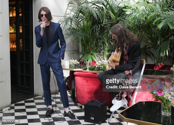 Tom Ogden and Josh Dewhurst of Blossoms perform at the Paul Smith SS19 VIP dinner during Paris Fashion Week at Hotel Particulier Montmartre on June...