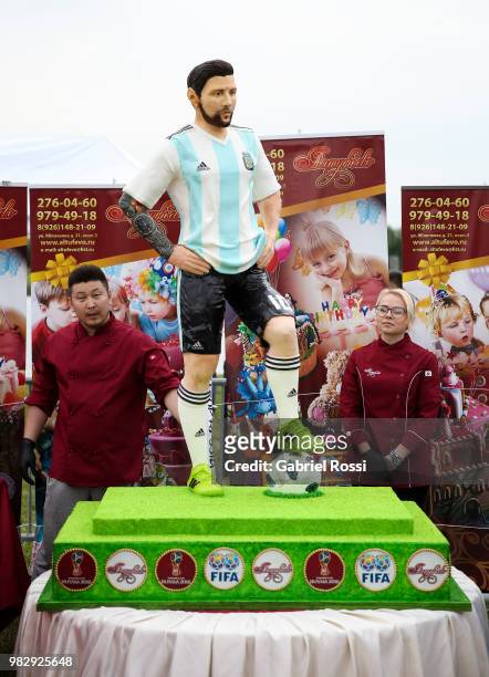 Cake with the figure of Lionel Messi is exhibited during a celebration made by fans and local villagers of Bronnitsy who gather to commemorate Lionel...